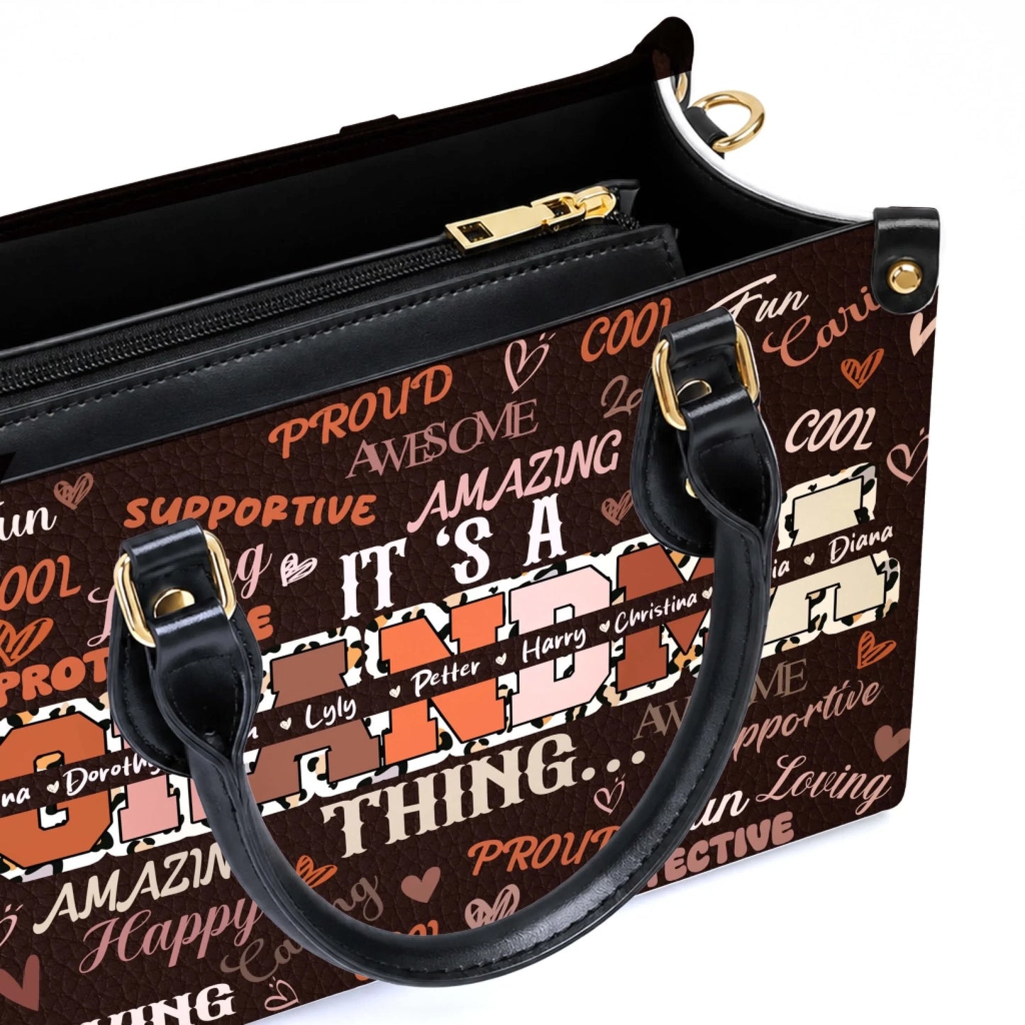 Close up of a custom Grandma handbag featuring leopard print lettering and family names on a brown leather surface.