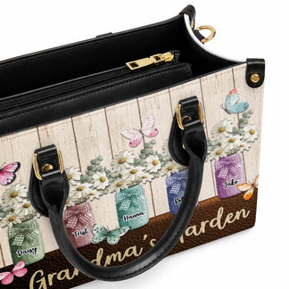 Close up view of the custom grandma garden purse interior and gold zipper detail showing high quality craftsmanship.