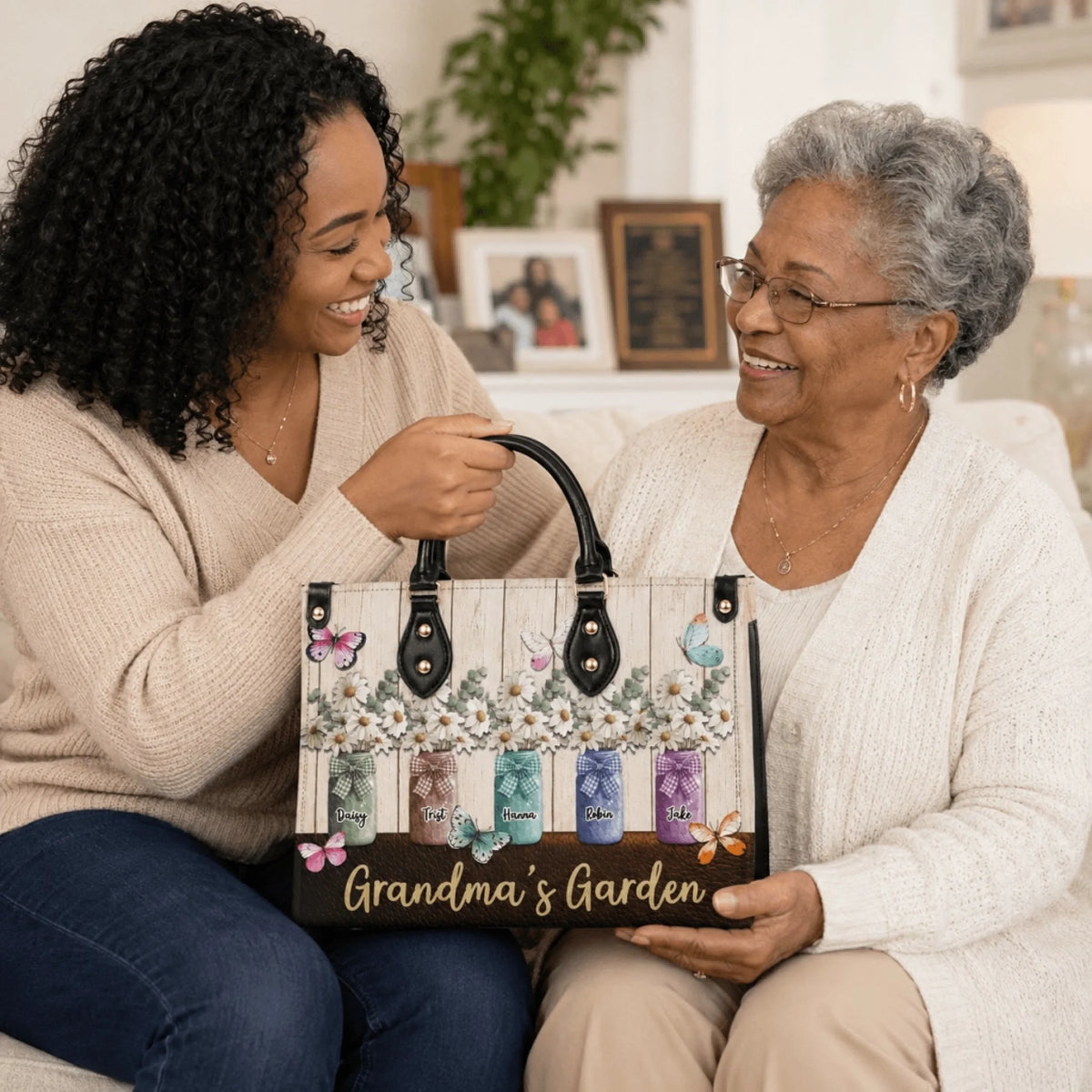 Grandmother receiving a custom Grandma's Garden tote bag with floral mason jar designs featuring family member names.