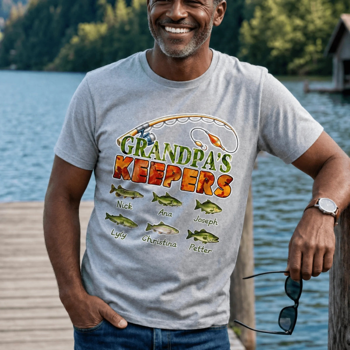 Custom fishing graphic t-shirt for men, featuring a rod and fish with personalized names for family members.