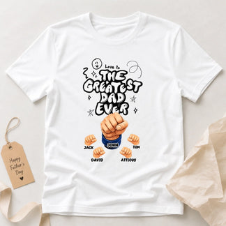 White t-shirt with 'Love to the Greatest Dad Ever' design featuring three fists and names on a light background.
