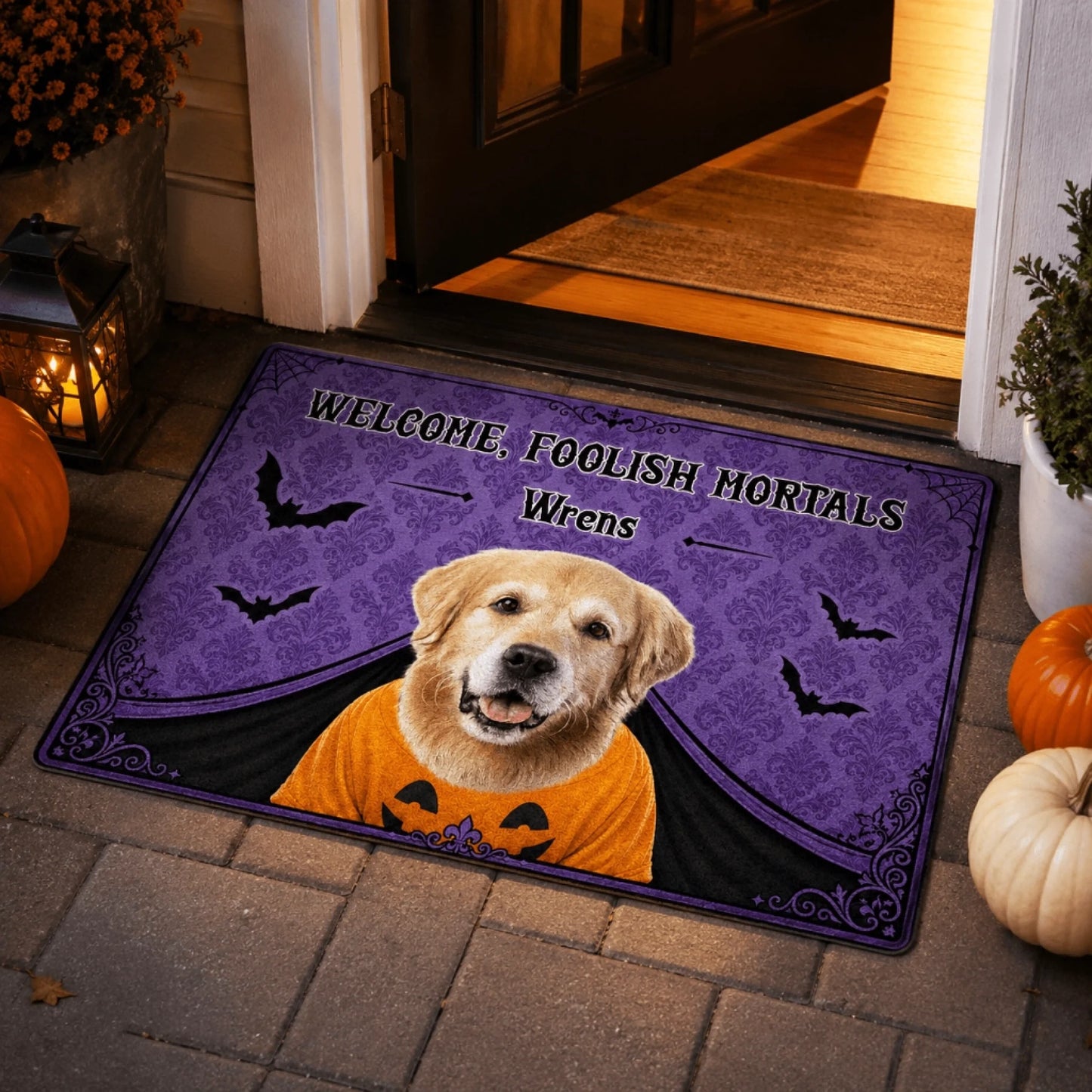 Personalized halloween welcome mat for porches with a custom golden retriever dog portrait and festive bats.