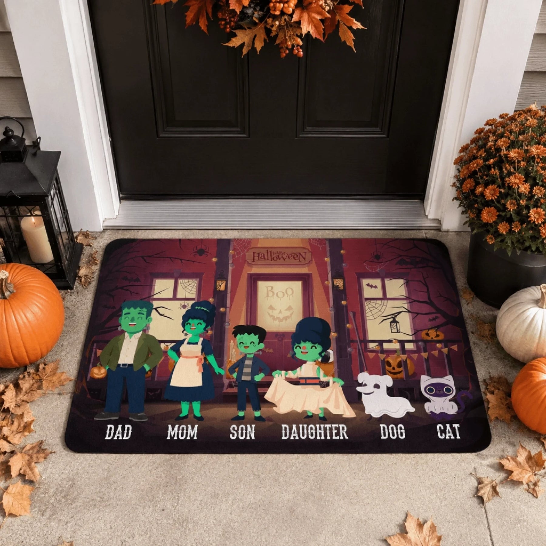 A personalized Halloween doormat featuring a cute monster family illustration with labels for Dad Mom Son Daughter Dog and Cat.