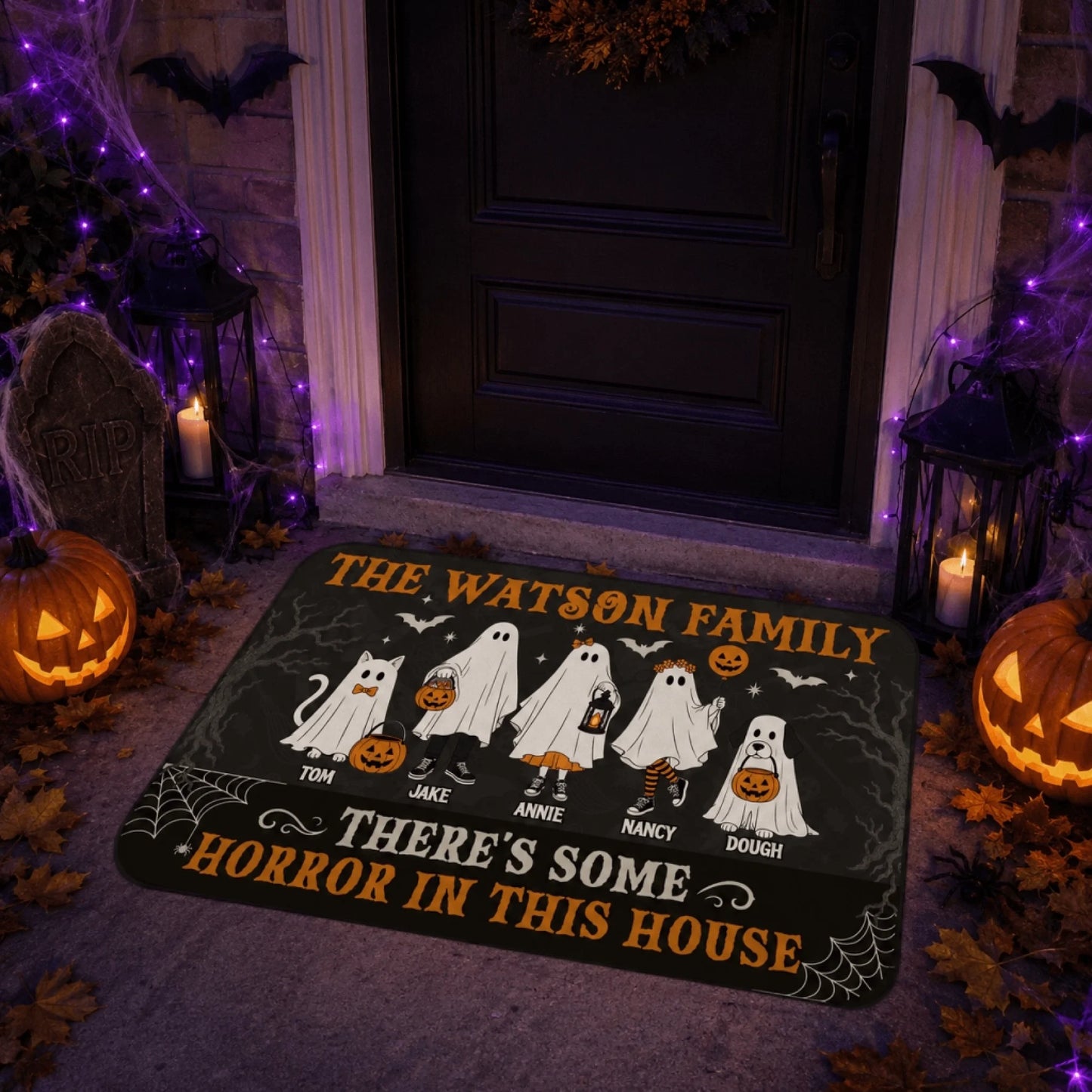 Custom halloween front porch doormat with cute ghost characters and personalized family name for spooky holiday decor.