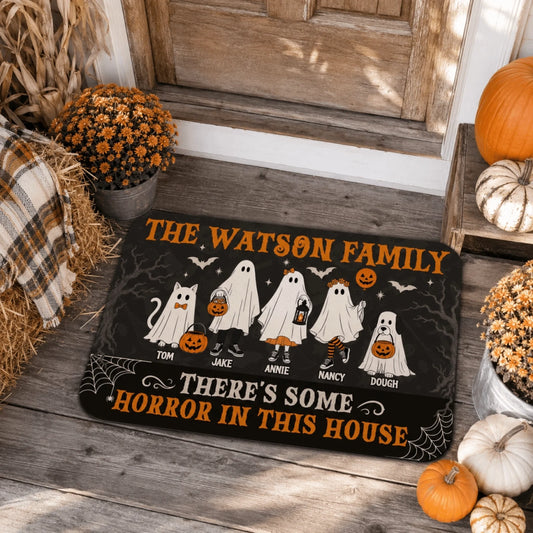 Custom family halloween doormat with ghost characters and pet featuring The Watson Family There Is Some Horror In This House quote.