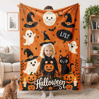 Festive personalized Halloween blanket with a custom photo of a child and name Lyly, featuring pumpkins and black cats.