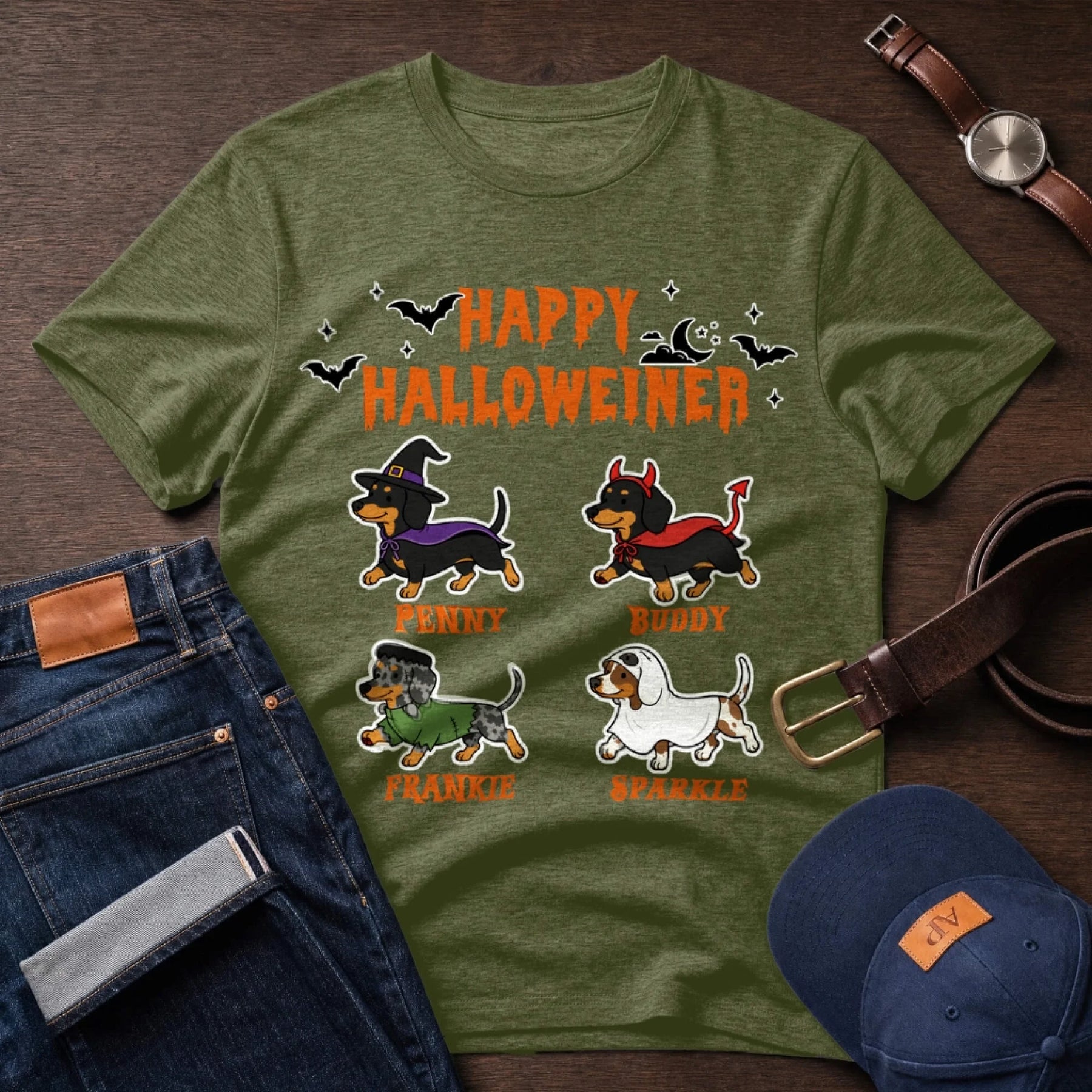 Custom olive green Halloween t-shirt featuring four adorable dachshunds in costumes with individual dog names printed.