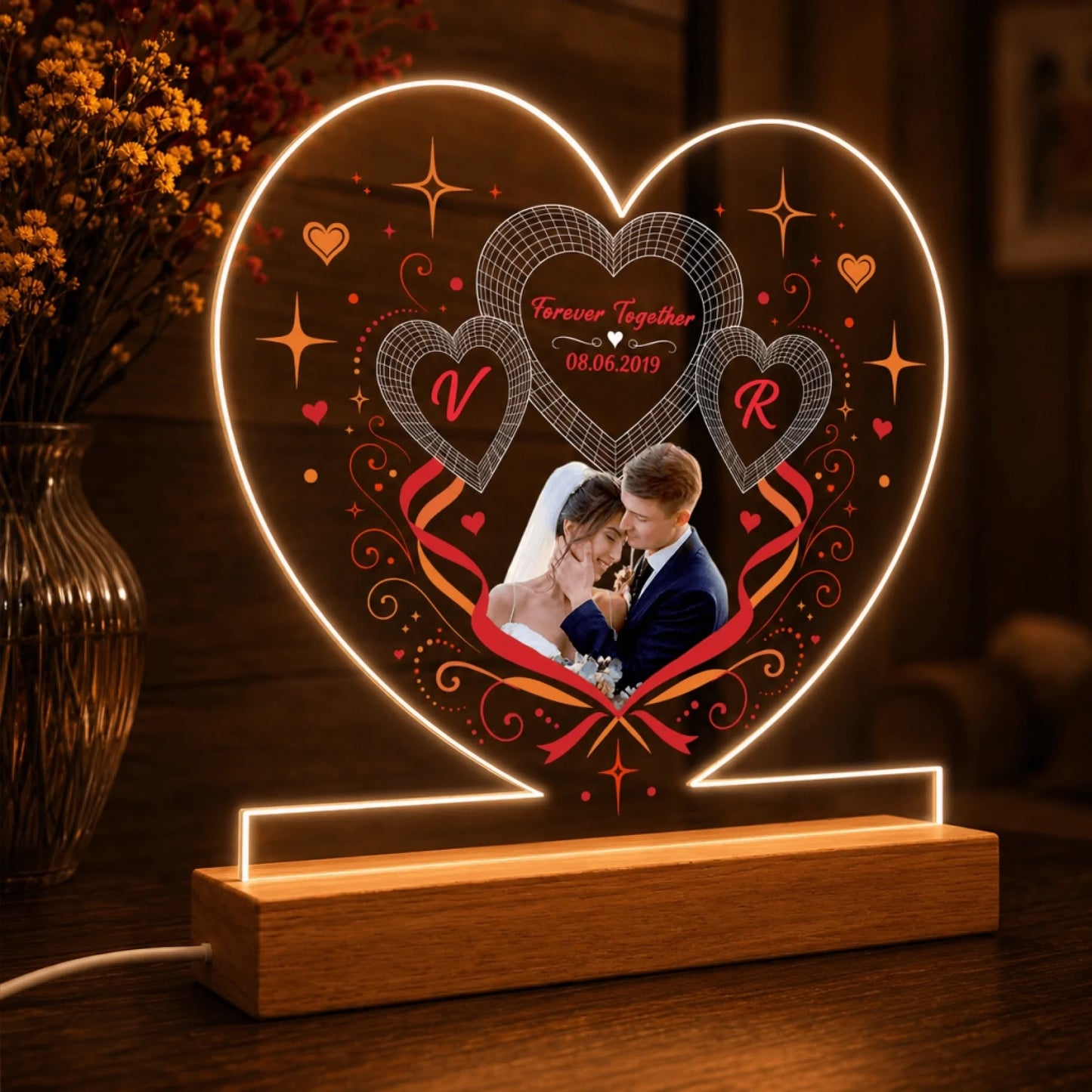 Custom LED night light in heart shape featuring a wedding couple photo initials V and R and date for anniversary gift.