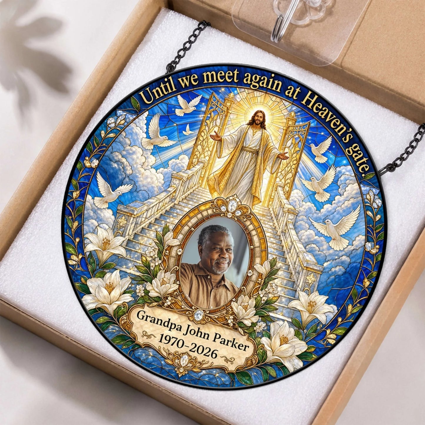 Custom memorial suncatcher with heaven theme, photo, and years displayed in a protective gift box for remembrance.
