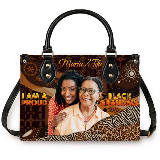 Custom photo and name handbag featuring I am a proud black grandma text on a patterned brown African tribal background.