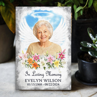 Personalized in loving memory canvas print with angel wings, floral design, custom photo, name, and dates of birth death.