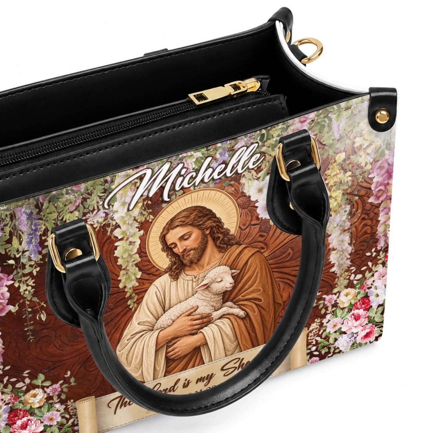 A personalized handbag featuring Jesus with a lamb, floral accents, and the name Michelle, perfect for a religious gift.