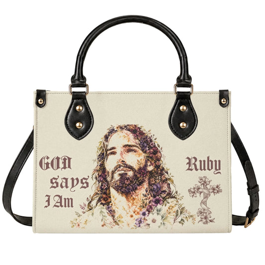 A beige personalized handbag featuring a floral portrait of Jesus and the name Ruby, perfect as a faith-inspired gift.