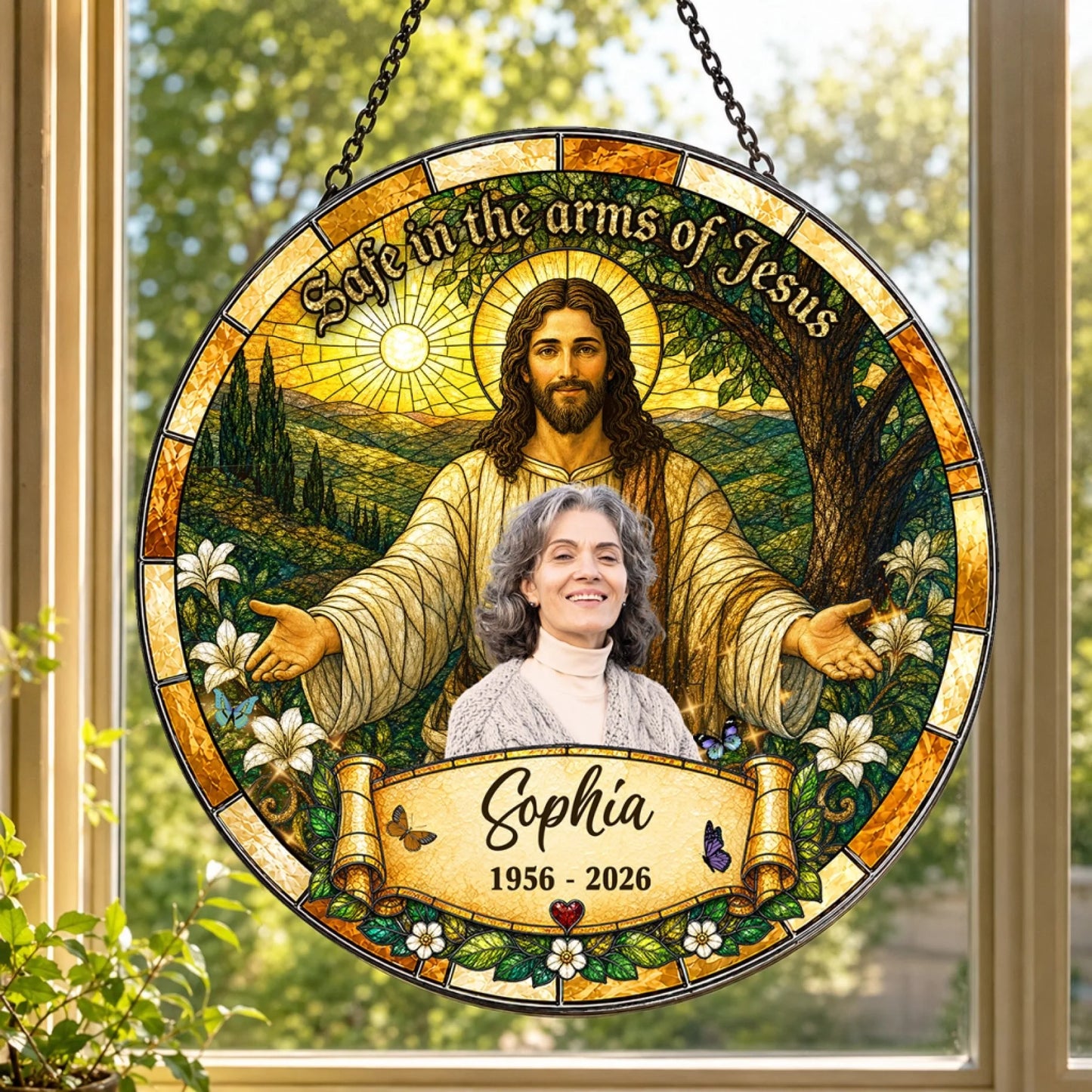 Round stained glass memorial ornament featuring Jesus holding a woman, personalized with name Sophia and years 1956-2026.