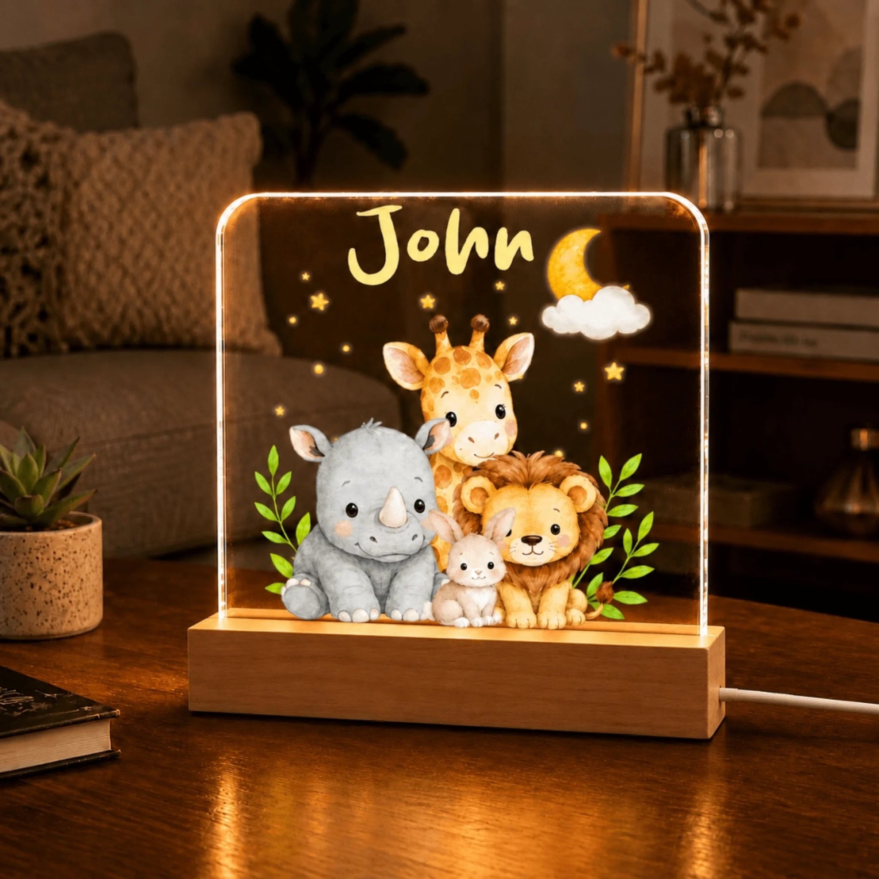 Custom name nursery decor night light with cute jungle animals including a giraffe rhino lion and baby bunny.