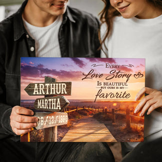 Couple holding a personalized canvas wall art featuring a beach theme, custom names, and a special date, a perfect anniversary surprise.