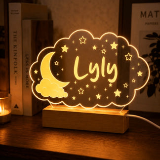 Custom acrylic cloud night light for kids displaying the name Lyly, ideal for a soft bedside lamp or nursery gift.