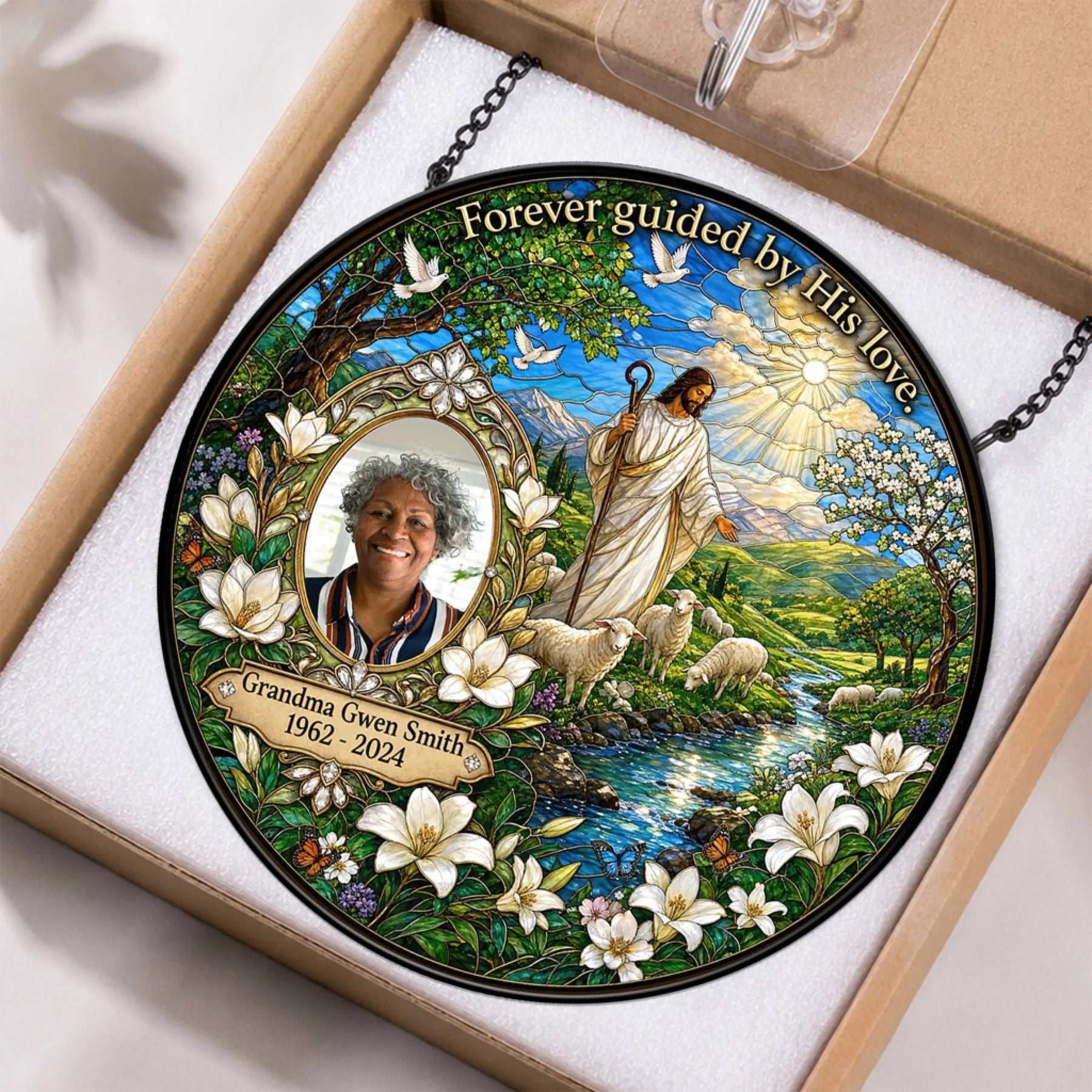Custom memorial acrylic suncatcher featuring a photo of Grandma Gwen Smith, religious shepherd artwork, and lilies.