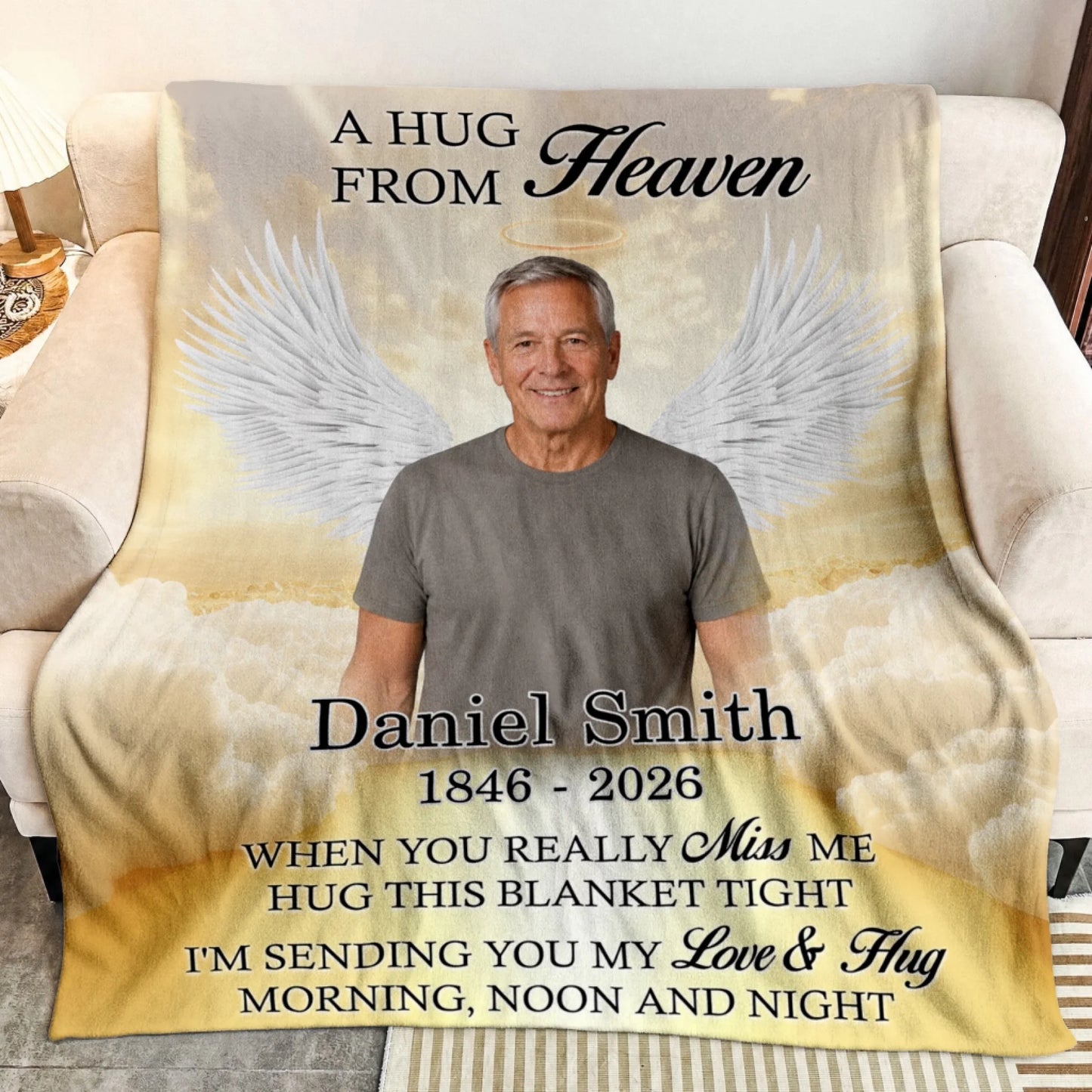 Custom memorial fleece blanket featuring a photo of a man with angel wings and the text A Hug From Heaven for sympathy.