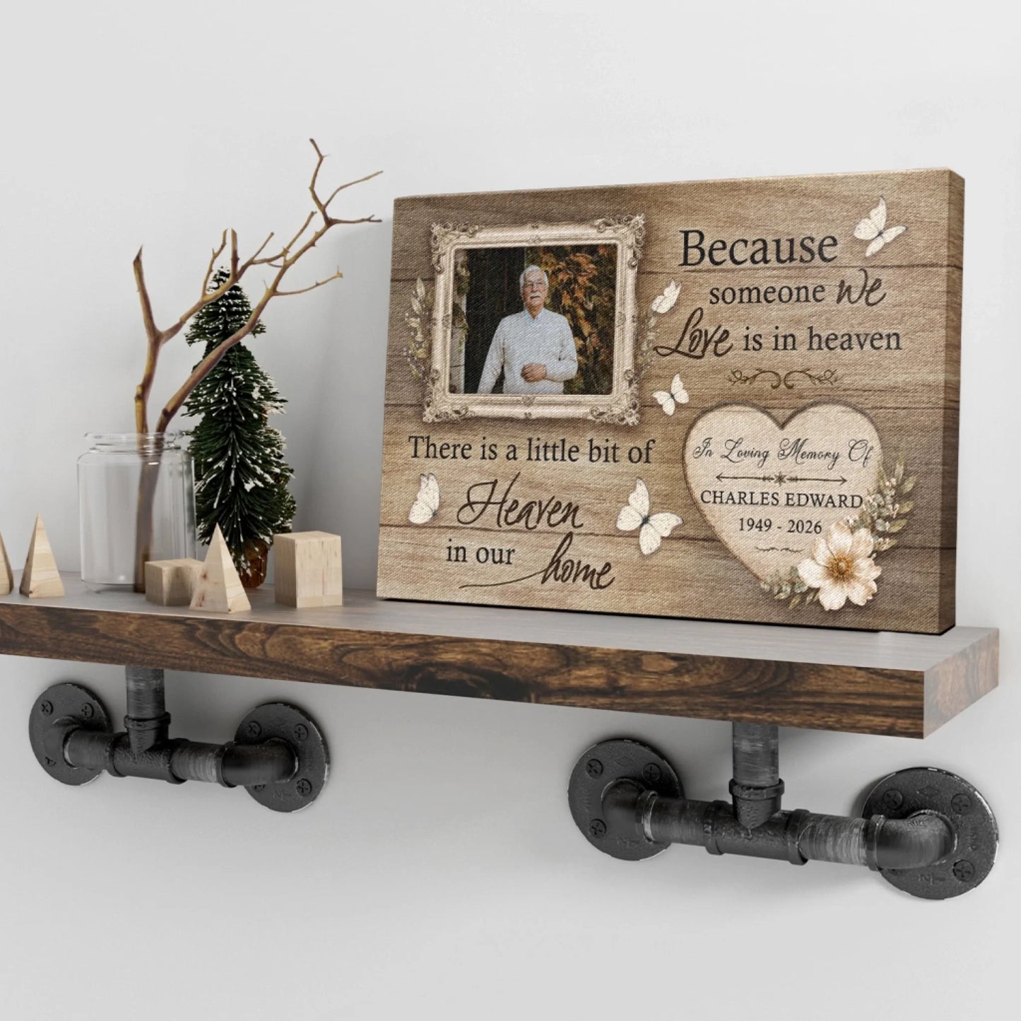 Personalized memorial plaque on a rustic wooden shelf, featuring a custom photo and dates as a thoughtful keepsake.