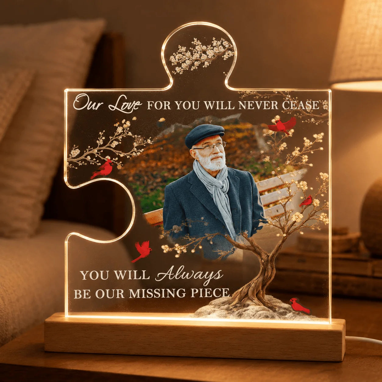 Custom memorial acrylic puzzle piece lamp with photo, cardinal birds, and engraved sentimental text on a wooden base.