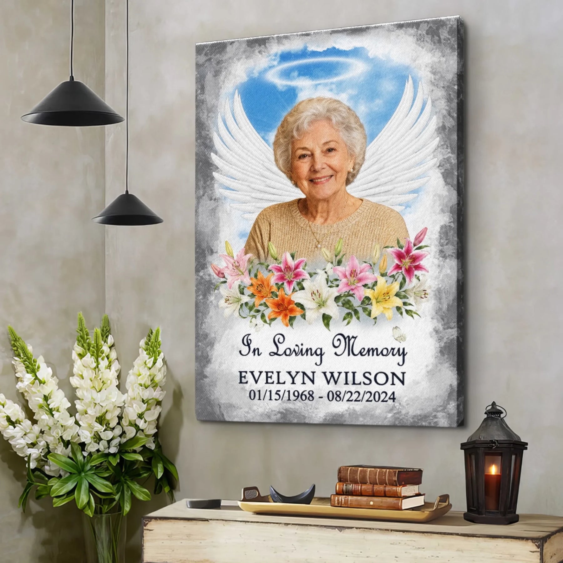 Personalized memorial wall art with angel wings, lilies, and custom text to honor the memory of a cherished relative.