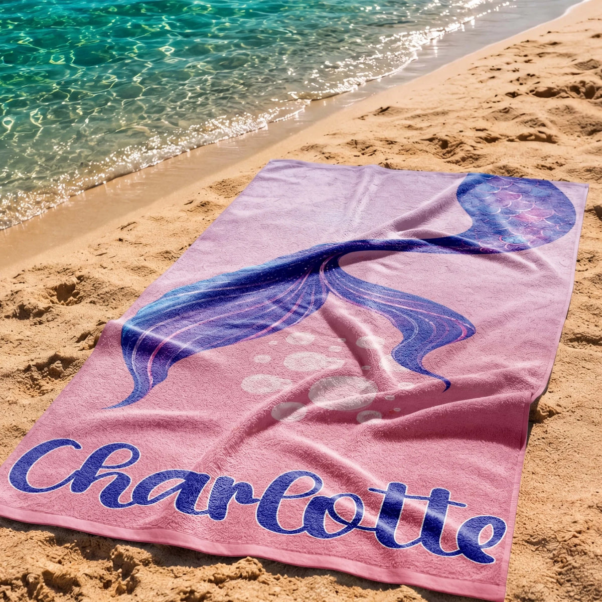 Custom pink mermaid tail beach towel for Charlotte printed on high quality absorbent fabric for pool and beach.