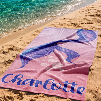 Custom pink mermaid tail beach towel for Charlotte printed on high quality absorbent fabric for pool and beach.