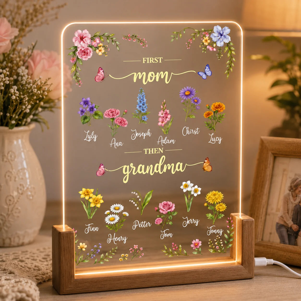 Custom acrylic LED night light featuring floral birth flower designs and names for mom and grandma Mother's Day gift.