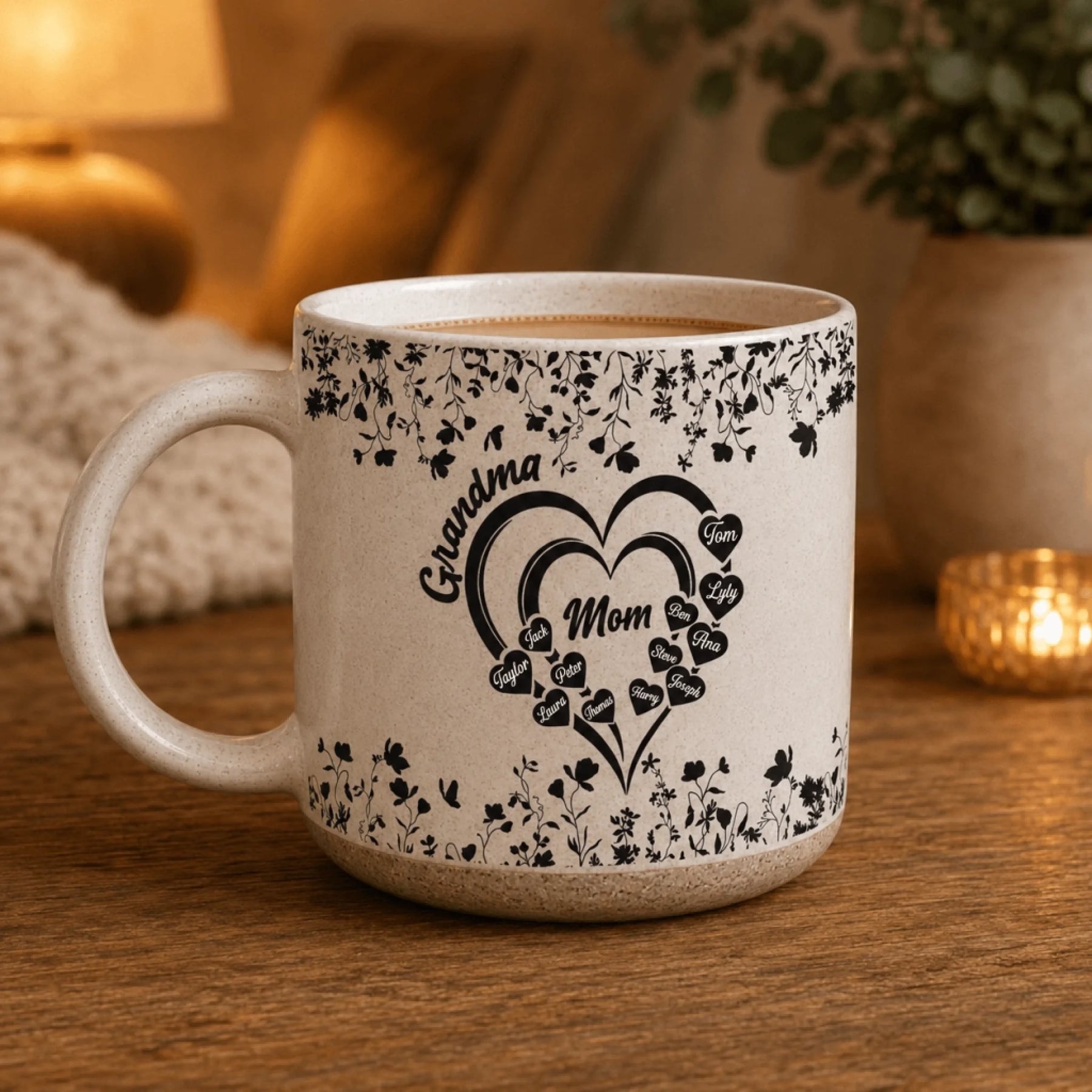 Ceramic coffee mug with floral heart print personalized for Mom and Grandma featuring custom names of family members.