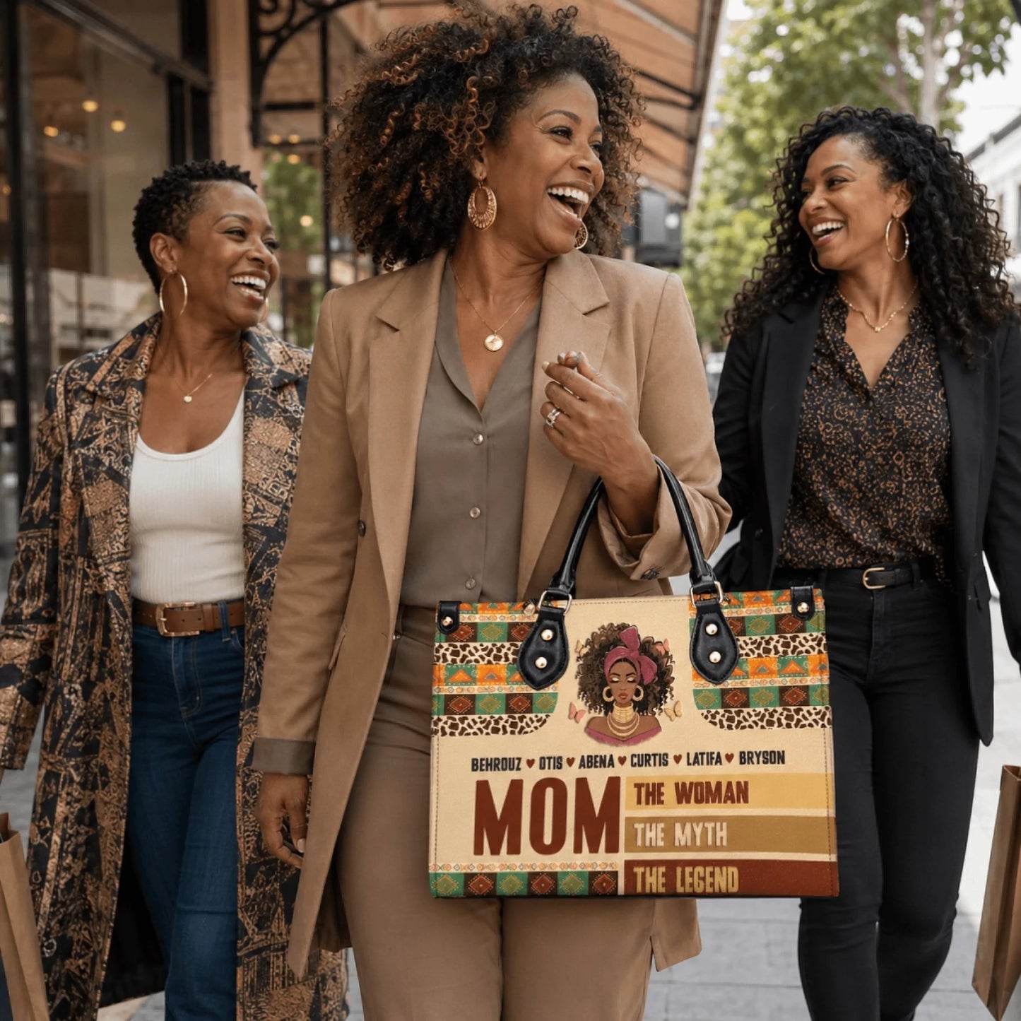 Stylish woman carrying a custom handbag featuring African American mom art and names, perfect for family gifts.