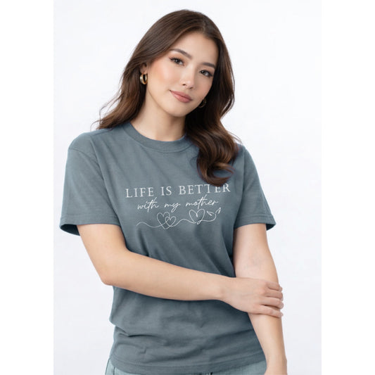 Woman wearing a gray t-shirt with 'Life is better with my mother' text on a white background