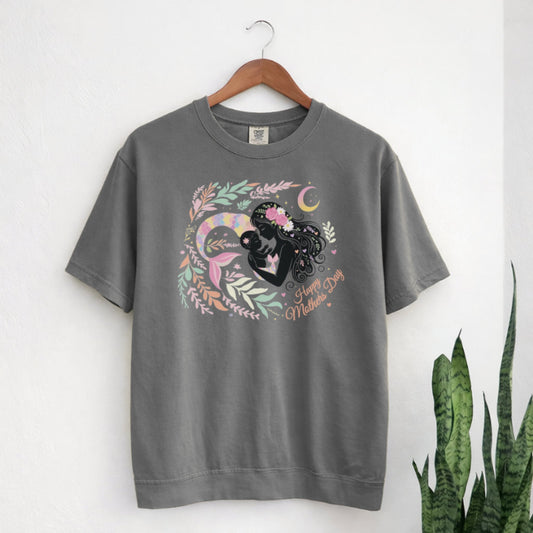 Gray t-shirt with a colorful graphic design on a hanger against a white background.