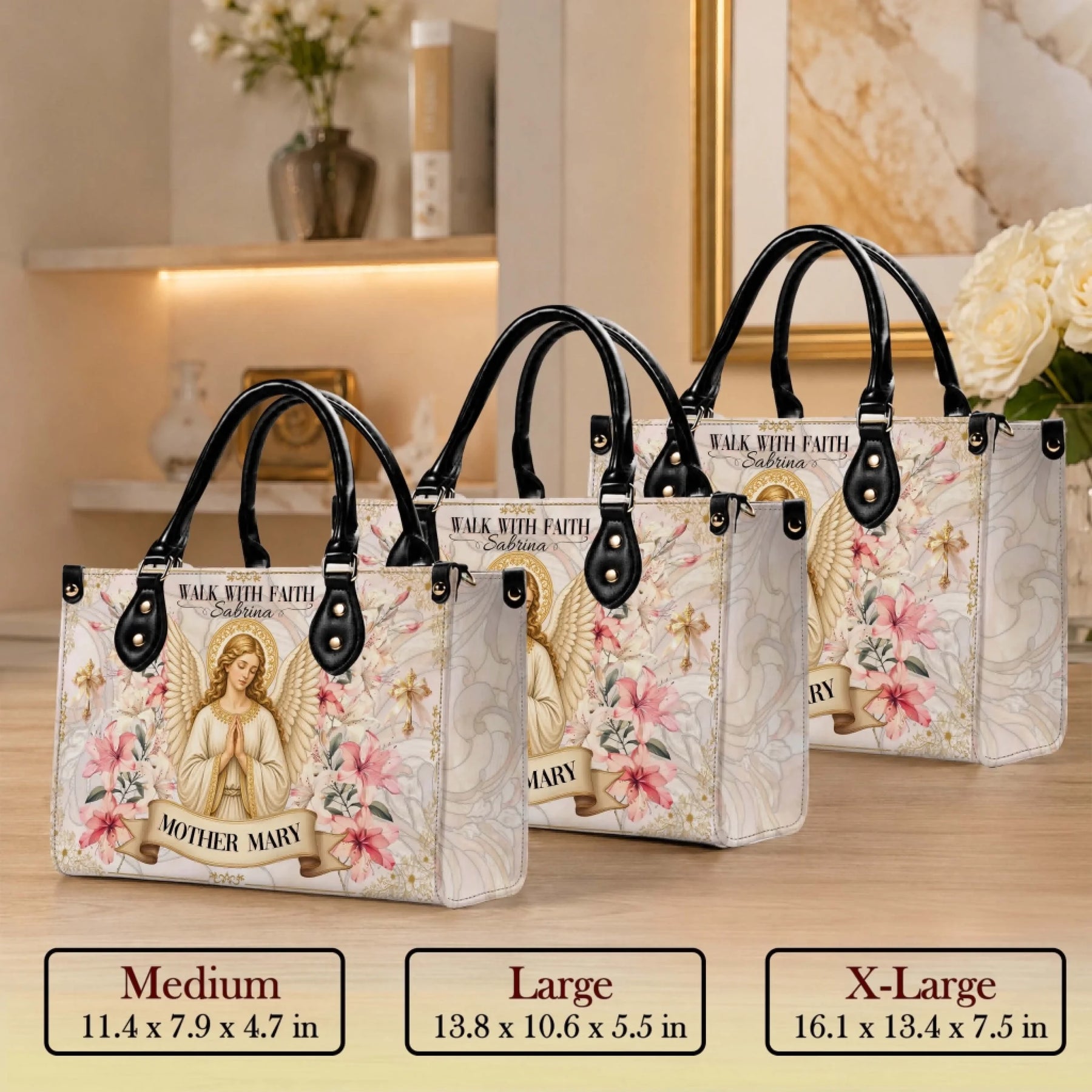 A set of three personalized Mother Mary and angel floral print PU leather handbags available in medium large and XL sizes.