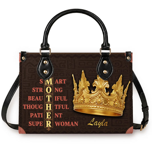 Personalized tote bag for mom featuring a golden crown and MOTHER acronym design with the custom name Layla on brown fabric.