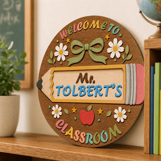 Personalized wooden sign for Mr. Tolbert's classroom with a cute apple and daisy design for teacher school decor.