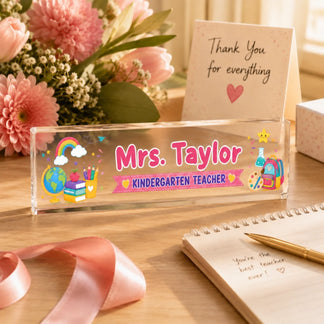 Personalized Mrs Taylor acrylic desk sign with colorful school graphics for kindergarten teacher appreciation gift.