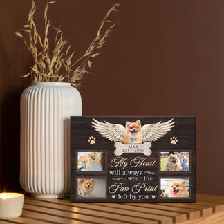 Custom pet memorial canvas on a tabletop with four photos, name Max, and a heartwarming pet tribute quote.