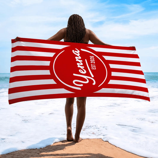A personalized red and white striped beach towel featuring the name Yenna and the year established 2026 for summer.