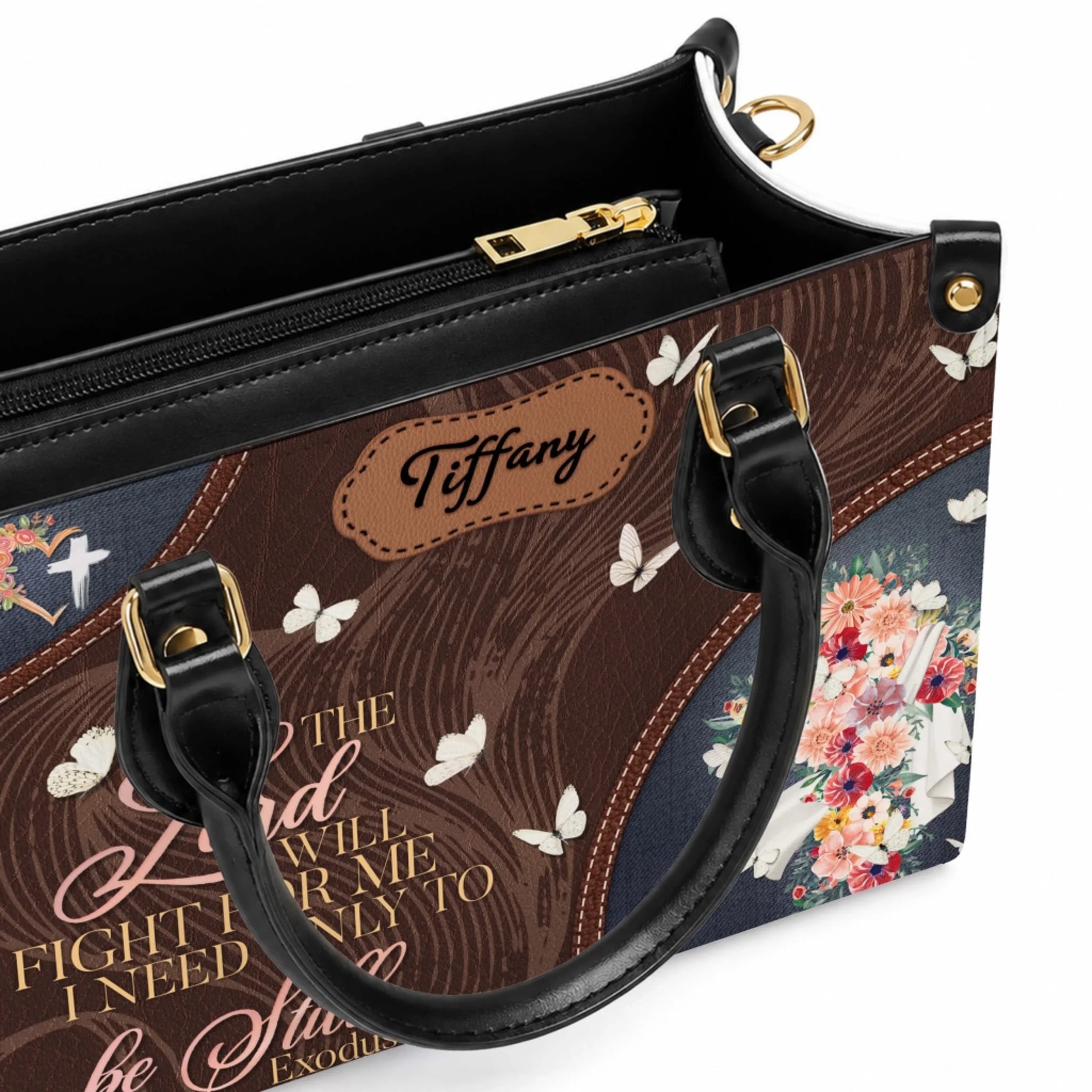 Personalized faux leather tote bag featuring the name Tiffany and the bible verse Exodus 14:14 with floral and butterfly art.