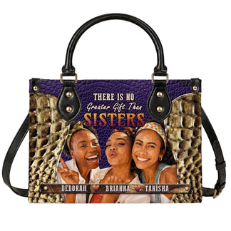 A stylish personalized handbag featuring a custom sisters photo and the quote There Is No Greater Gift Than Sisters.