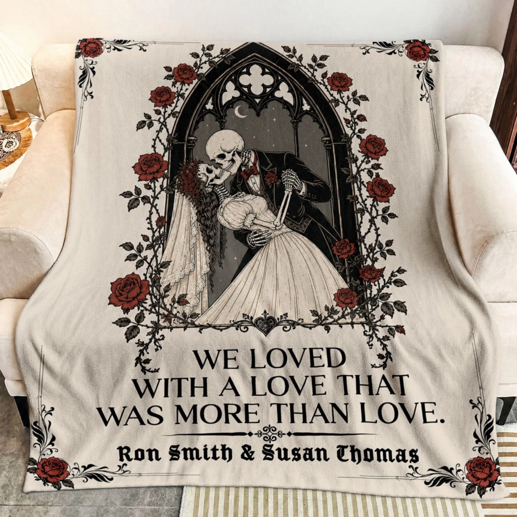 Personalized fleece blanket featuring a romantic skeleton couple, gothic roses, and the quote We Loved With A Love That Was More Than Love.