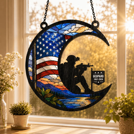 Personalized soldier silhouette suncatcher featuring a US flag pattern and memorial name and date for a veteran gift.