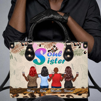 Close up of a custom Soul Sister handbag with four friends illustration and personalized names for a best friend gift.