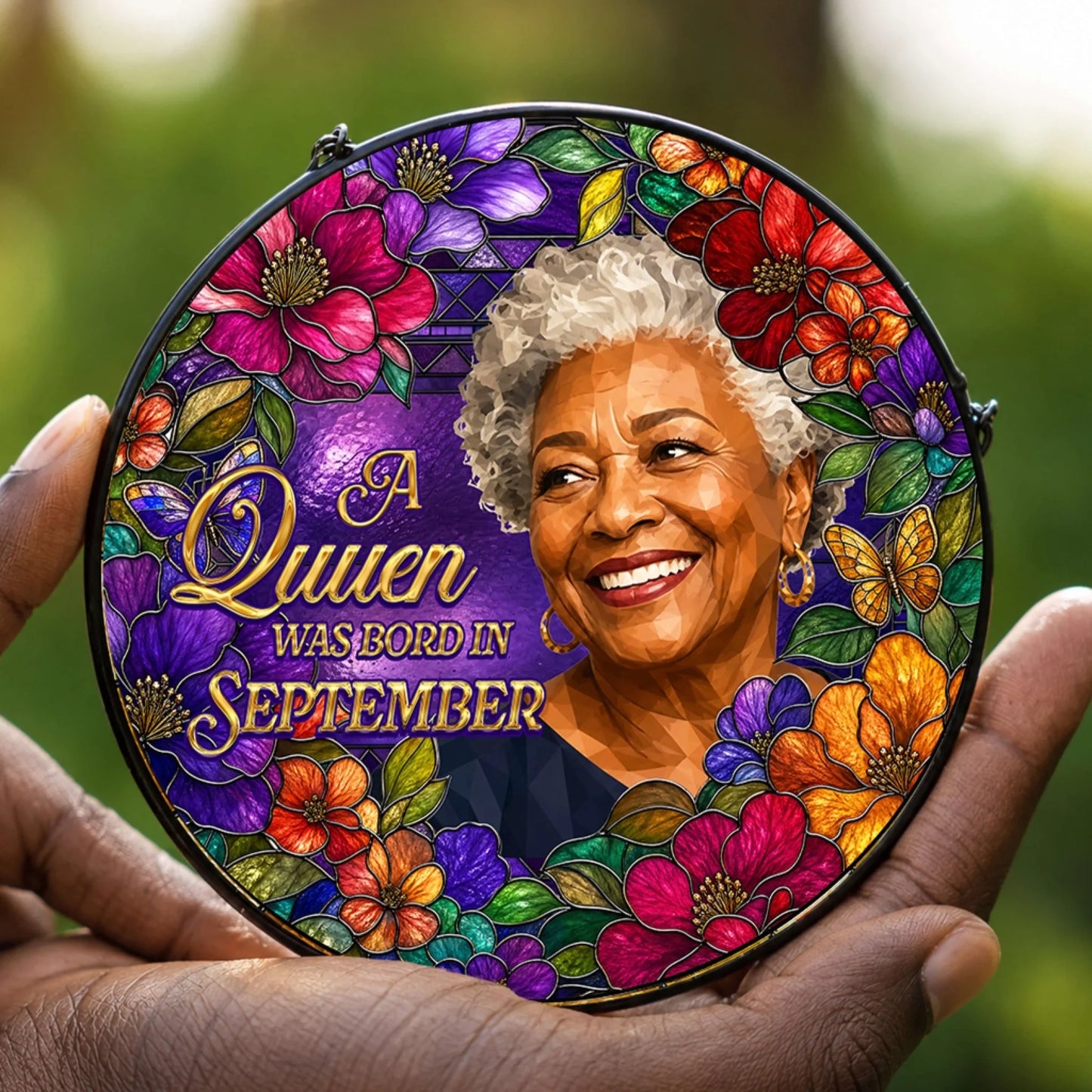 Custom stained glass acrylic suncatcher featuring a portrait of an elegant woman with floral design for a September birthday.