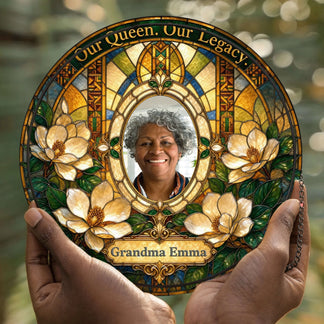 A personalized stained glass suncatcher featuring a photo of Grandma Emma and the inscription Our Queen Our Legacy.