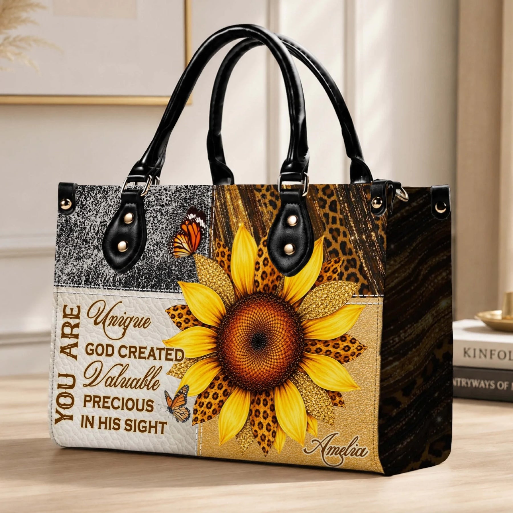 Side angle of a stylish sunflower print PU leather handbag featuring a custom name and butterfly decorative design.