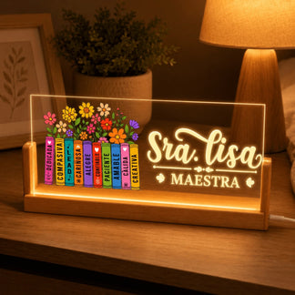 A custom LED acrylic night light for teachers featuring Sra Lisa and a stack of books with floral and uplifting text.