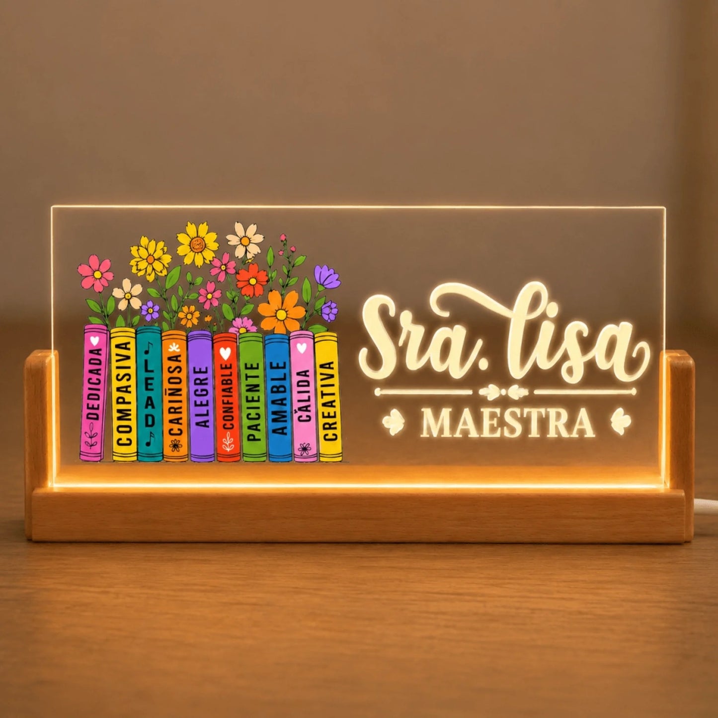 Custom acrylic LED night light for teachers featuring Sra Lisa and a colorful stack of books with floral accents