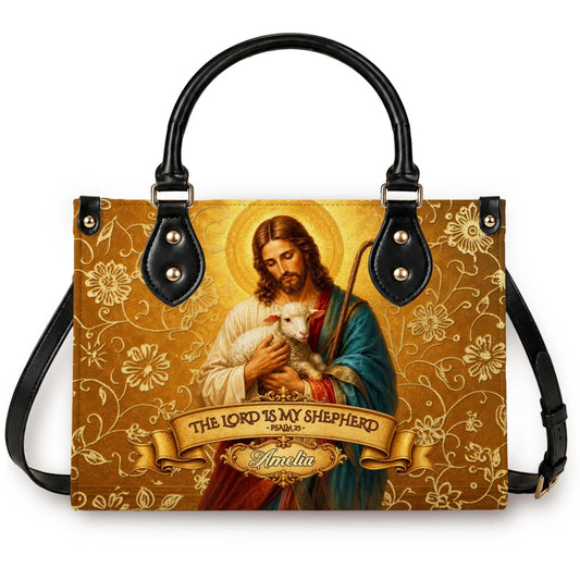 A custom floral religious handbag featuring Jesus holding a lamb with the personalized name Amelia and Psalm 23 text.